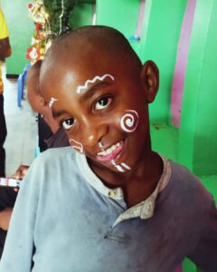 Child creating artwork during a mental health support session