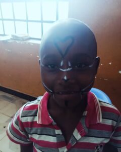 Child creating artwork during a mental health support session